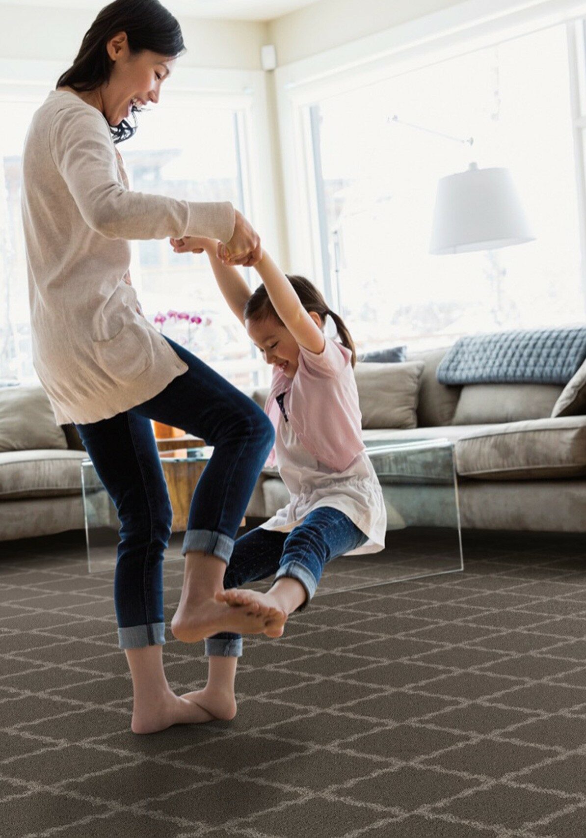Mom and daughter having fun | Holmes Carpet Center